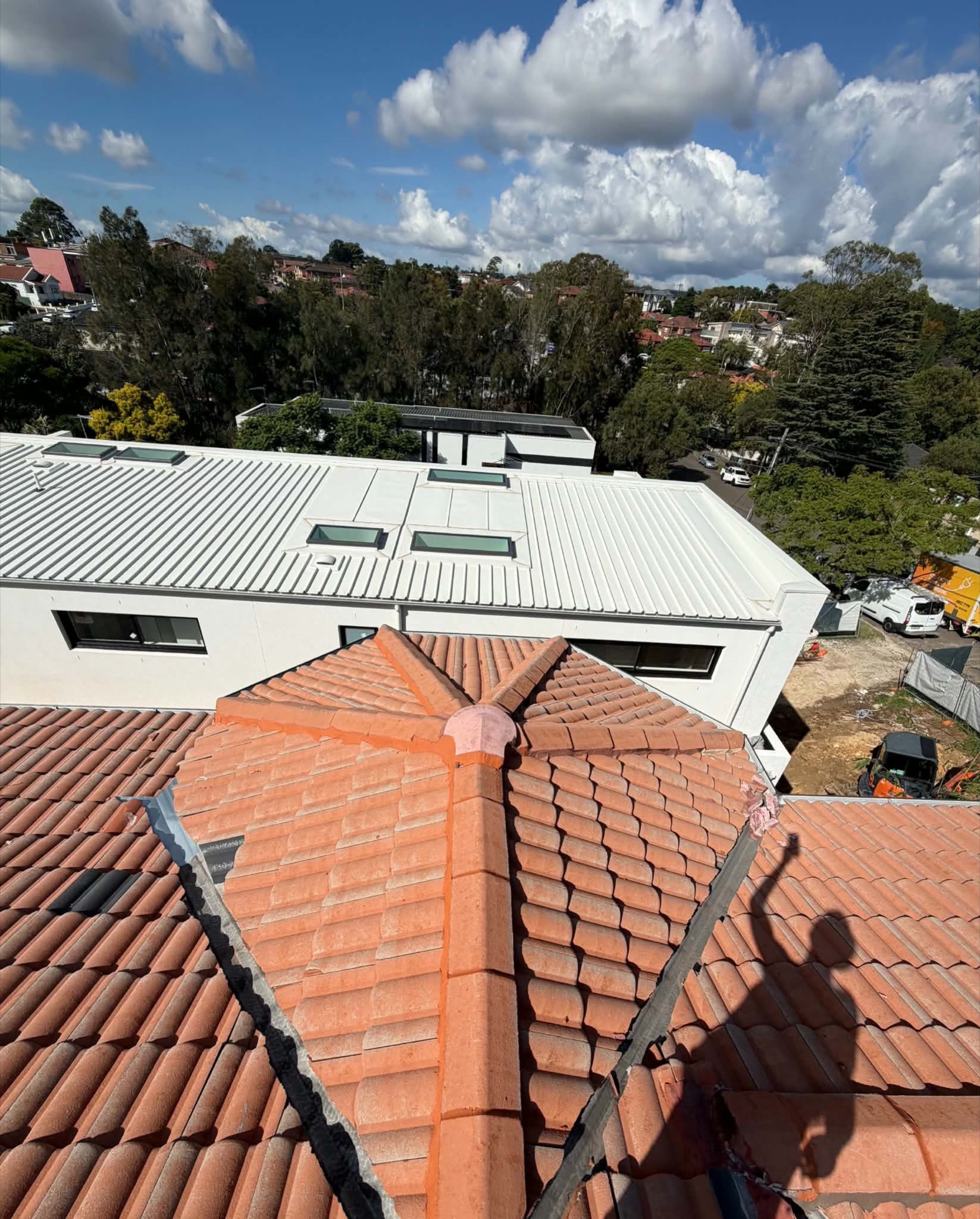Faded terracotta tiled roof before restoration
